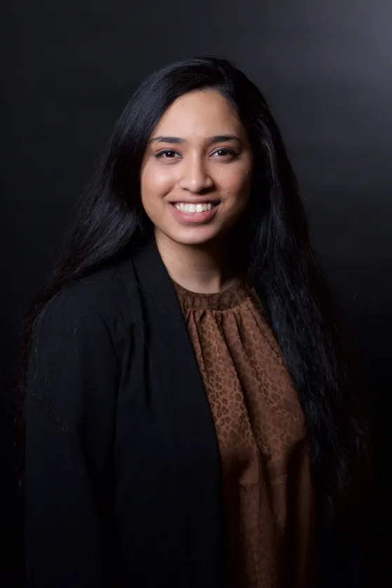 Corporate headshot of a woman — iRolls studio standard