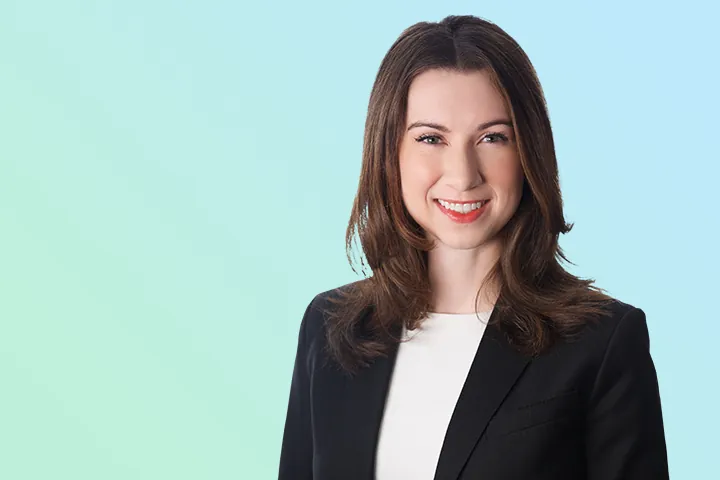 Team headshot on a soft gradient background