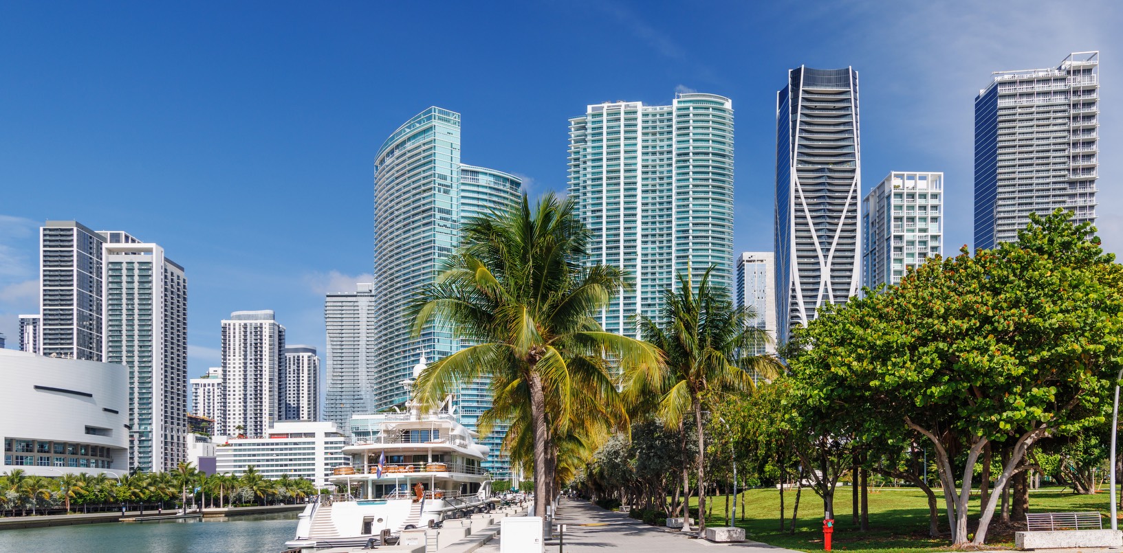 Miami waterfront skyline with palm trees and high-rises — production location